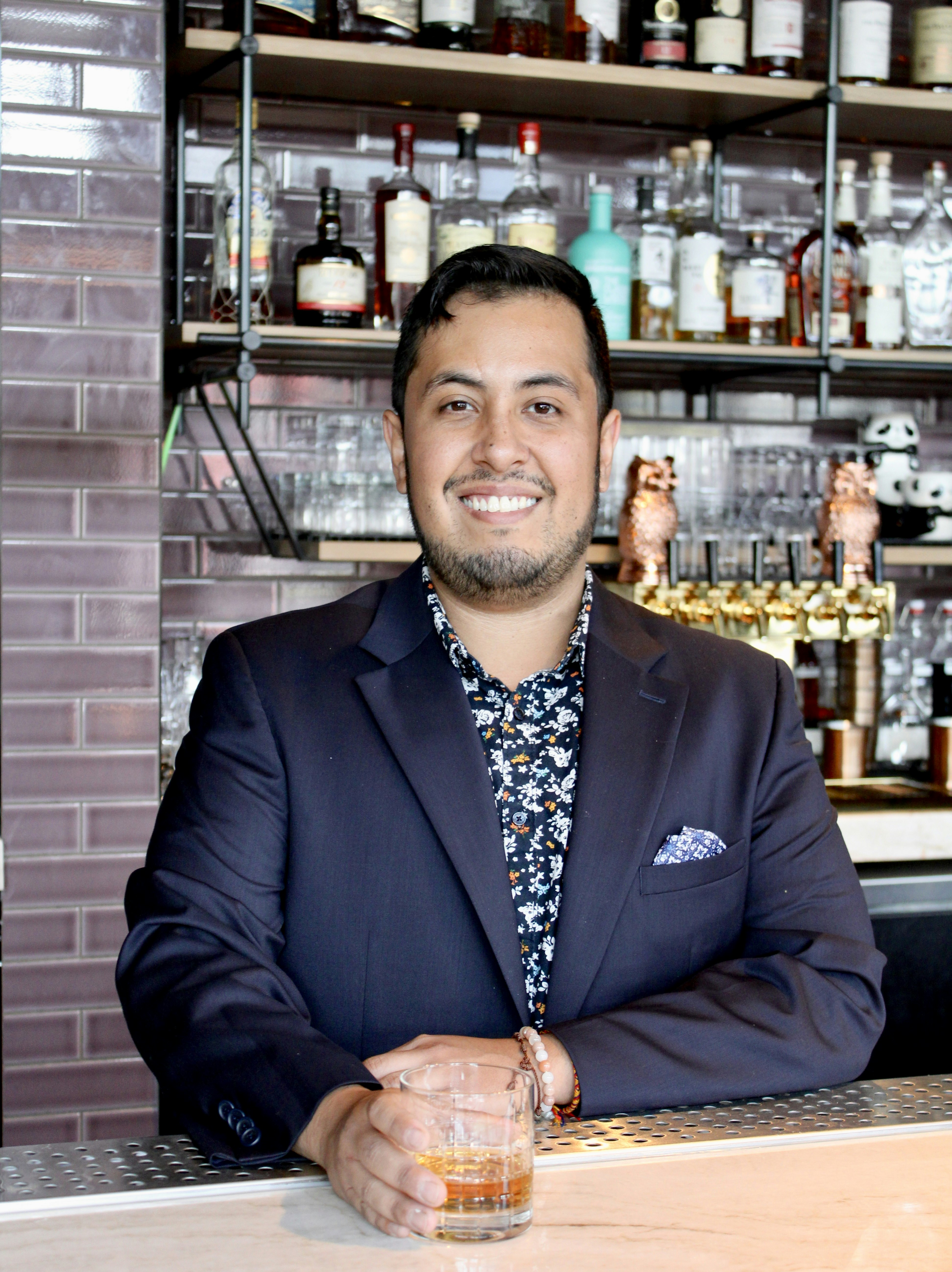 a man sitting at a table in a restaurant